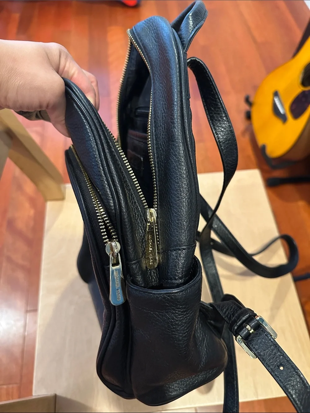 Michael Kors Black Pebbled Leather Mini Backpack with Gold Plaque